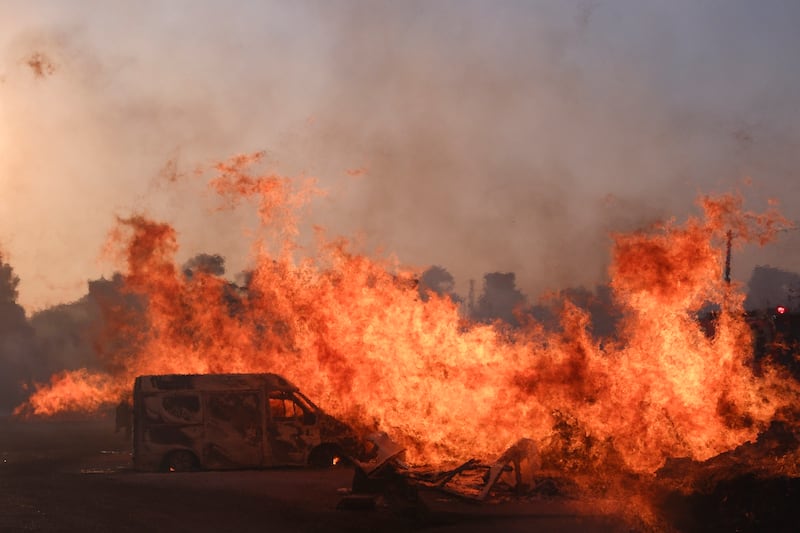 A wildfire near Athens gutted scores of homes and scorched land (AP Photo/Aggelos Barai)