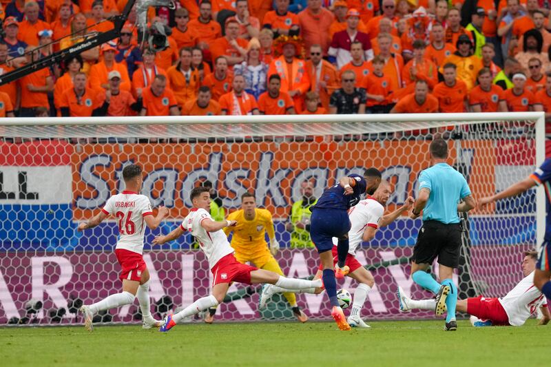 Cody Gakpo equalises for Netherlands (Sunday Alamba/AP)