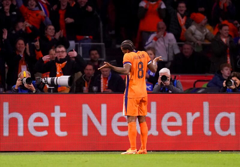 The Netherlands’ Georginio Wijnaldum celebrates scoring