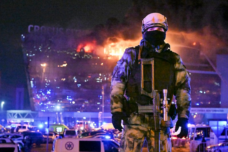 A Russian Rosguardia (National Guard) serviceman secures an area near Crocus City Hall (Dmitry Serebryakov/AP)