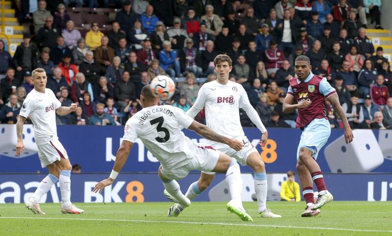 Foster, right, pulled a goal back for Burnley