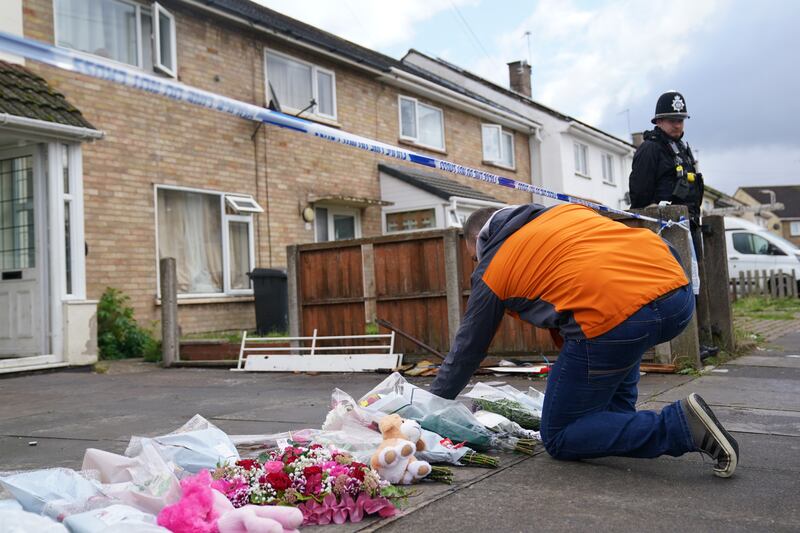 Tributes have been left outside the house