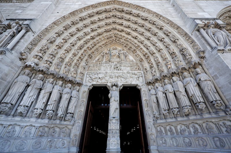 The main entrance of Notre Dame (Stephane de Sakutin/Pool Photo via AP)