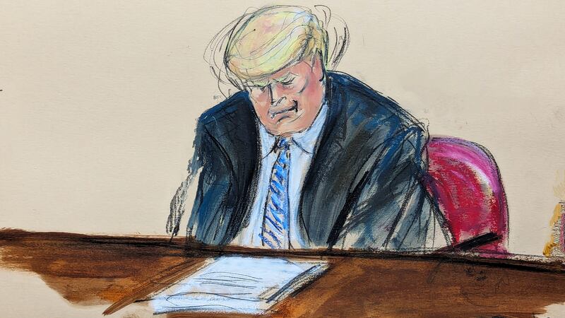 Donald Trump reacts as Michael Cohen testifies that he told Mr Trump that the Stormy Daniels story was not contained (Elizabeth Williams/AP)