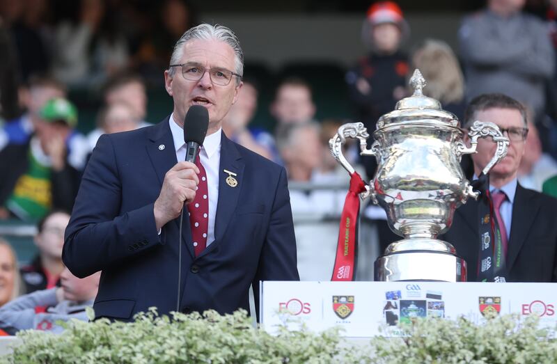 GAA President Jarlath Buth presents down with the Tailteann Cup at Croke Park in Dublin.
PICTURE COLM LENAGHAN