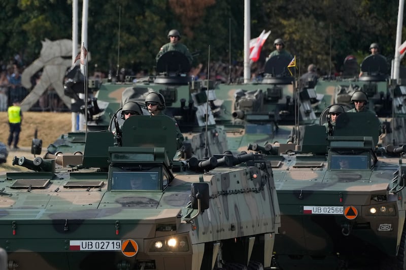 Poland’s military parade during the annual observances on Poland’s armed forces holiday in Warsaw (Czarek Sokolowski/AP)