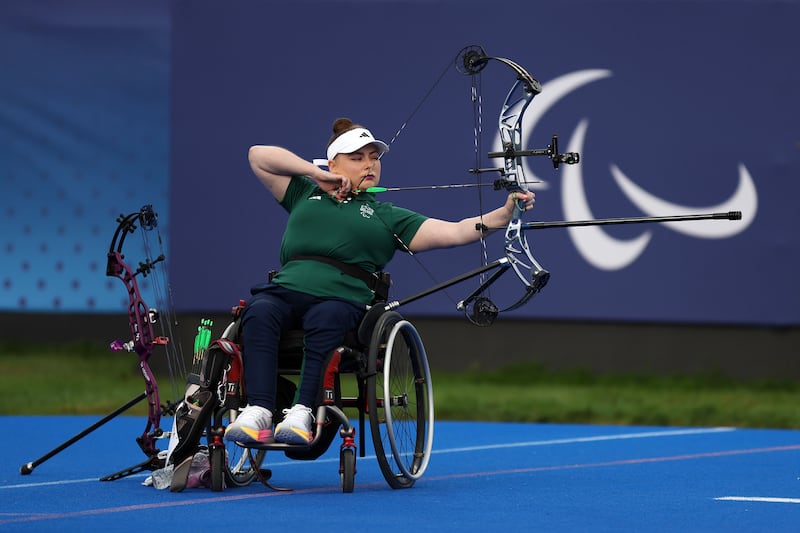 PARIS, FRANCE - AUGUST 30: Kerrie Leonard of Team Ireland competes against Jiamin Zhou of Team People's Republic of China (not pictured) in the Women's Individual Compound Open 1/16 Elimination Match 1 on day two of the Paris 2024 Summer Paralympic Games at Esplanade Des Invalides on August 30, 2024 in Paris, France. (Photo by Steph Chambers/Getty Images)