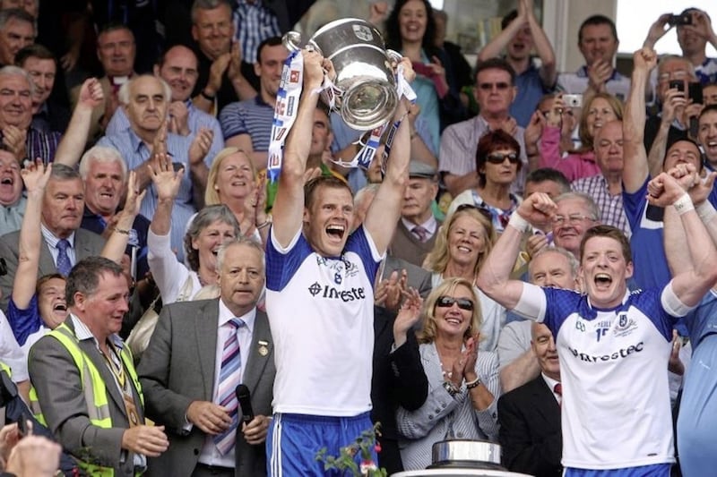 Owen Lennon lifts the Anglo-Celt Cup with Conor McManus alongside him in 2013.<br />Picture Colm O'Reilly.