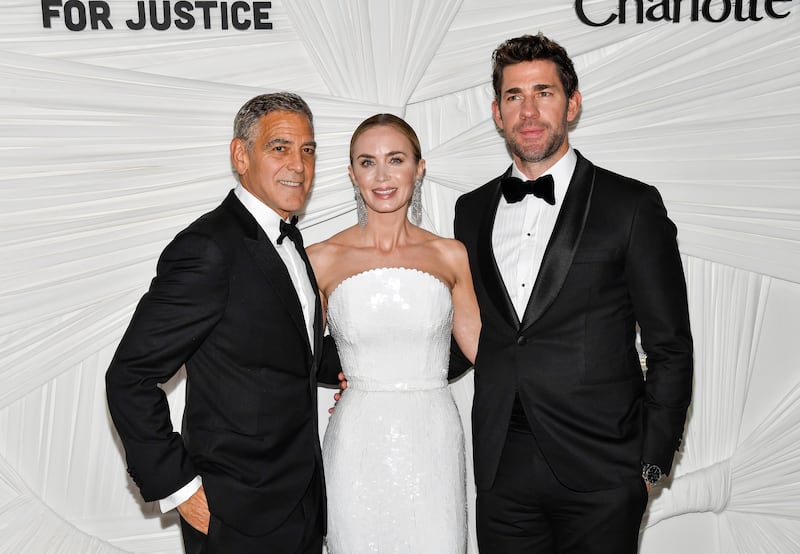 George Clooney, left, Emily Blunt and John Krasinski attend The Albies hosted by the Clooney Foundation for Justice at the New York Public Library in New York (Evan Agostini/Invision/AP)