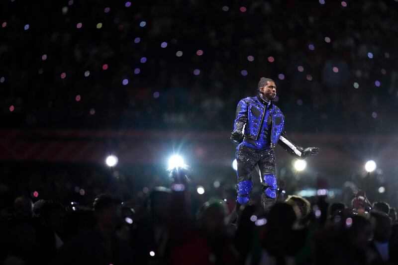 Usher performs during half-time of the NFL Super Bowl 58 football game between the San Francisco 49ers and the Kansas City Chiefs