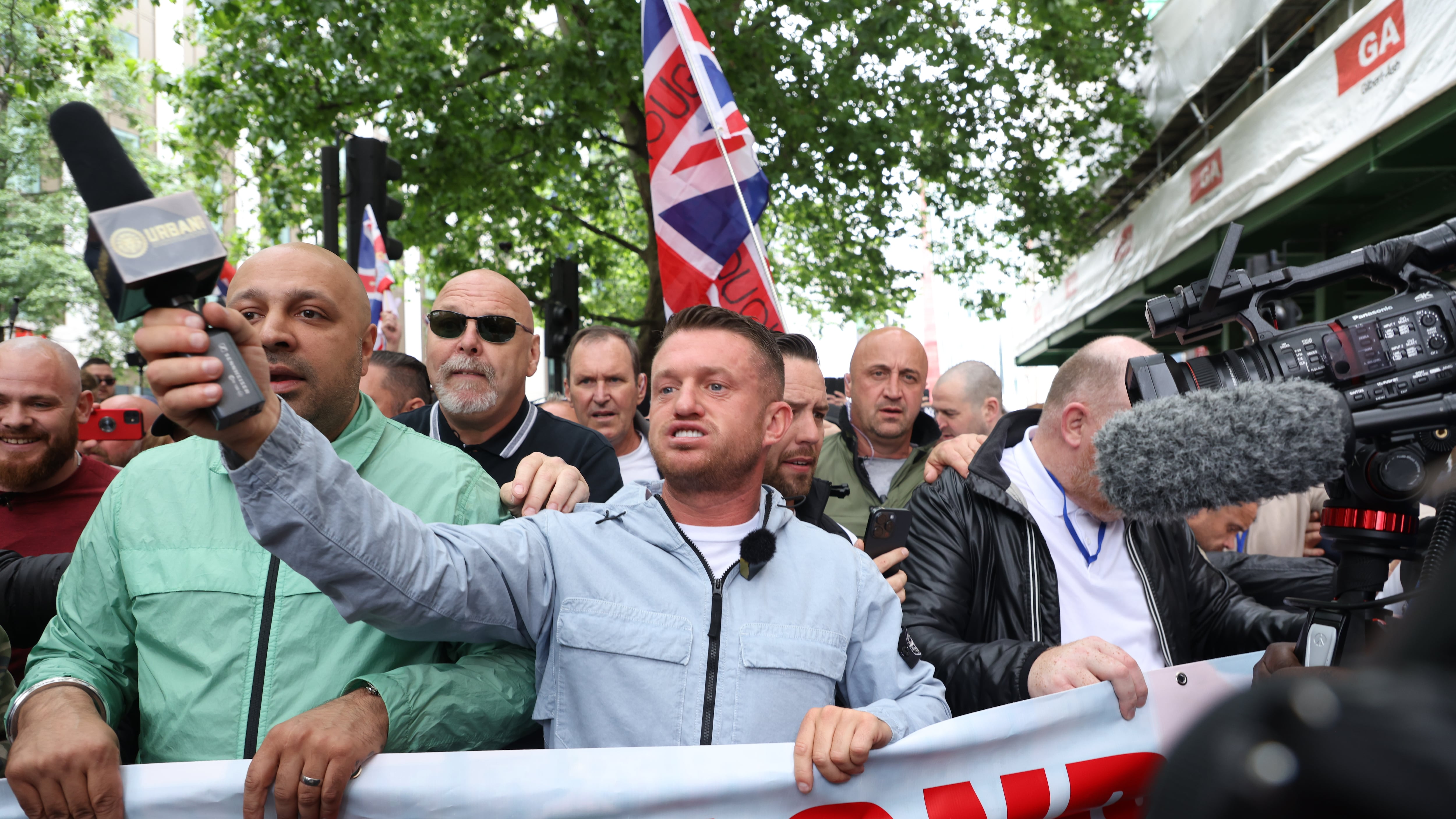 Tommy Robinson, whose real name is Stephen Yaxley Lennon, leads a protest march through London