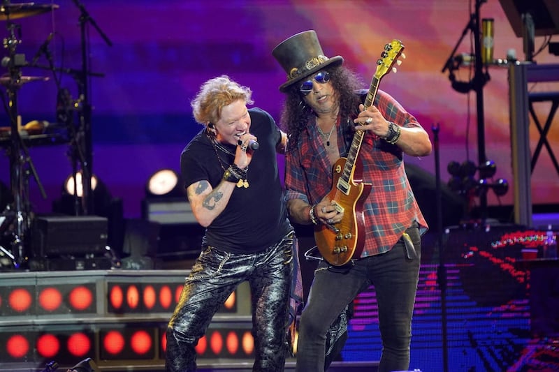 Axl Rose and Slash of Guns N’ Roses performing on the Pyramid Stage at the Glastonbury Festival in Somerset in 2023