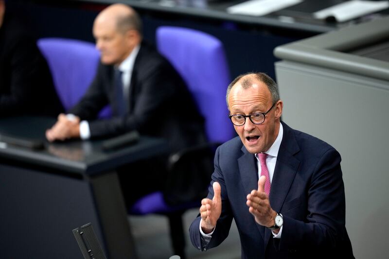 Friedrich Merz, chairman of the Christian Democratic Union party, speaks during a session of the German parliament in Berlin (Ebrahim Noroozi/AP)