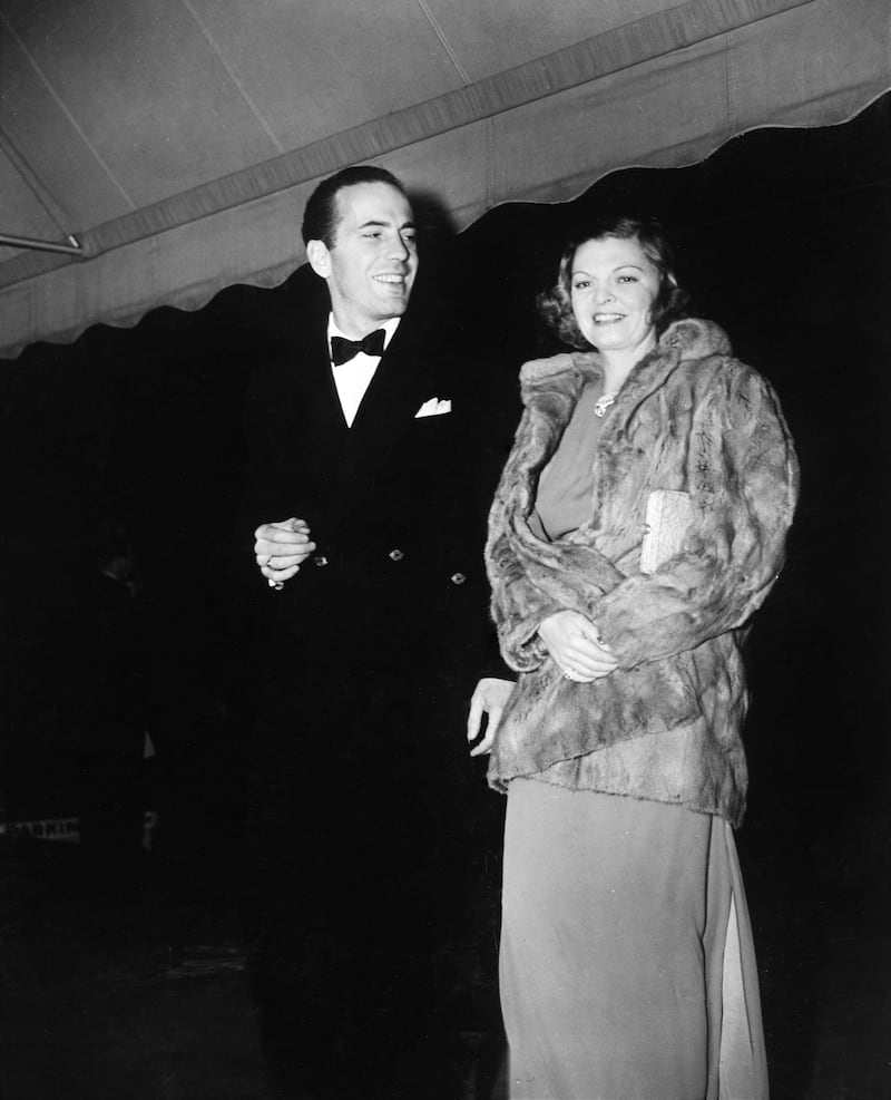 HUMPHREY BOGART and MAYO METHOT at the 35th Anniversary Party of the original Hollywood Hotel in December 1937