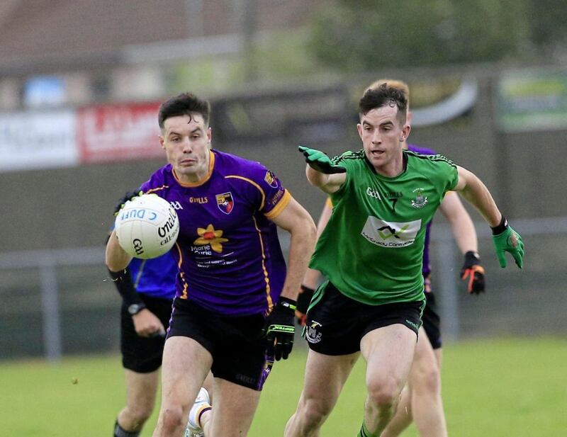 James Guinness (left), scorer of Carryduff's goal in their Down SFC victory over Castlewellan at St Patrick's Park, Newcastle.<br /> Pic Philip Walsh