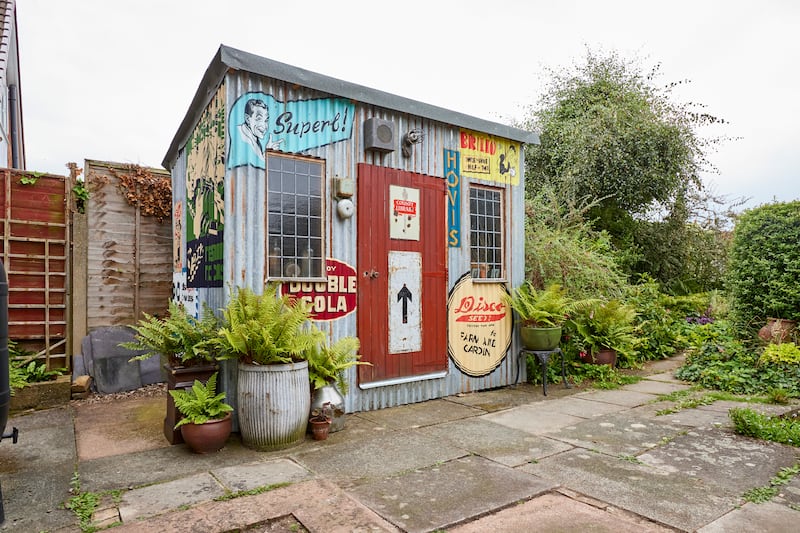 Wayne Dawber decorated the inside and outside of his shed with hand painted murals and vintage signs (Cuprinol)