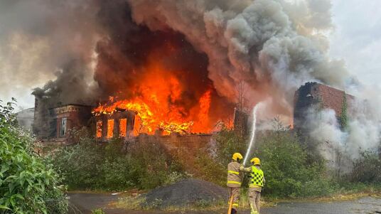Firefighters tackling the blaze at Hilden Mill on Tuesday. PICTURE: ROBBIE BUTLER/FACEBOOK