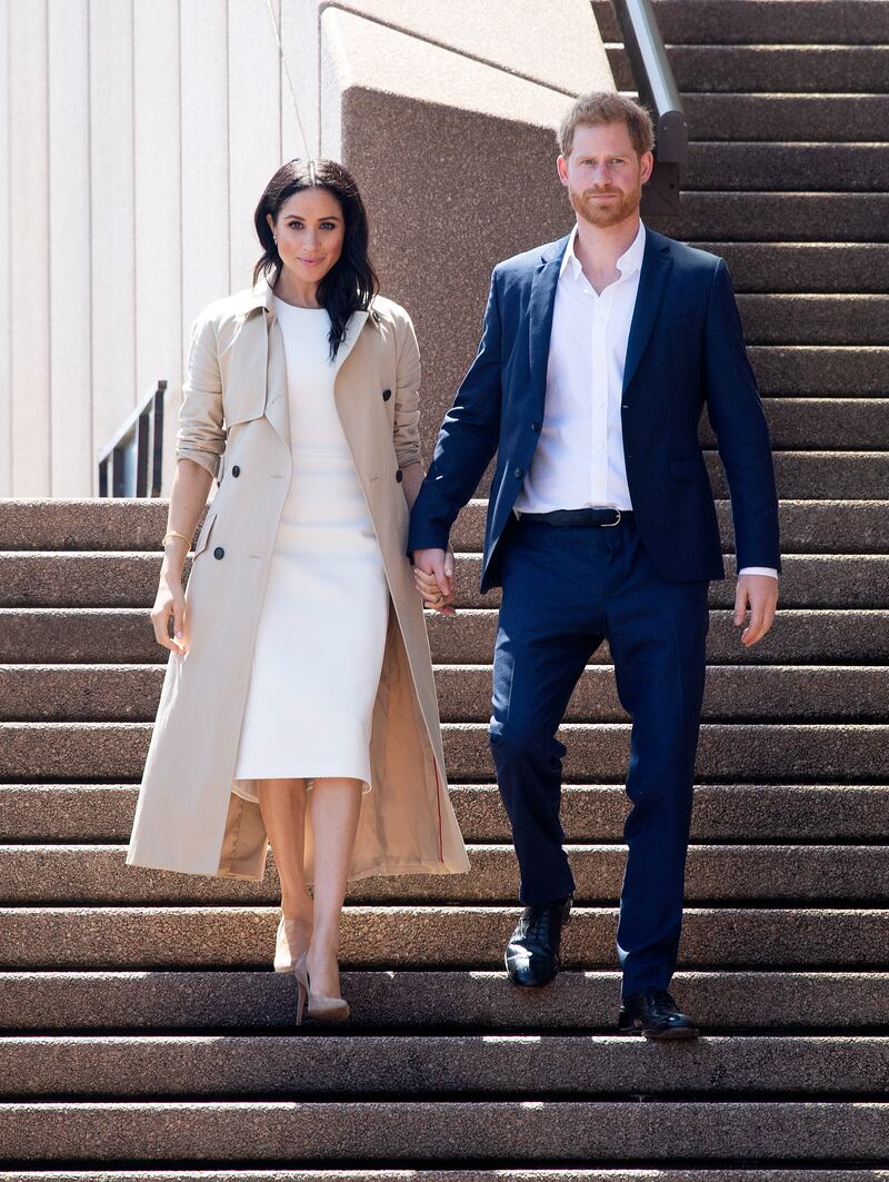 The Duchess of Sussex opted for a longer, boxy trench coat for her public appearances