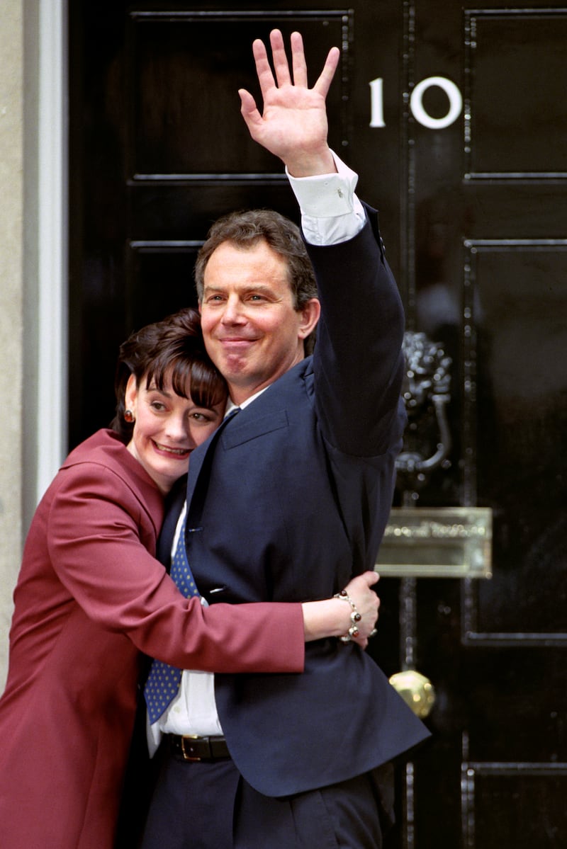 Tony and Cherie Blair embrace in front of No 10 after Labour swept to power in 1997