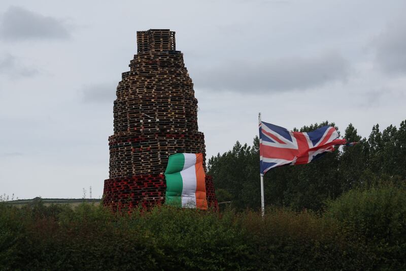 A large Irish tricolour on a bonfire at Inverary playing fields in east Belfast.
