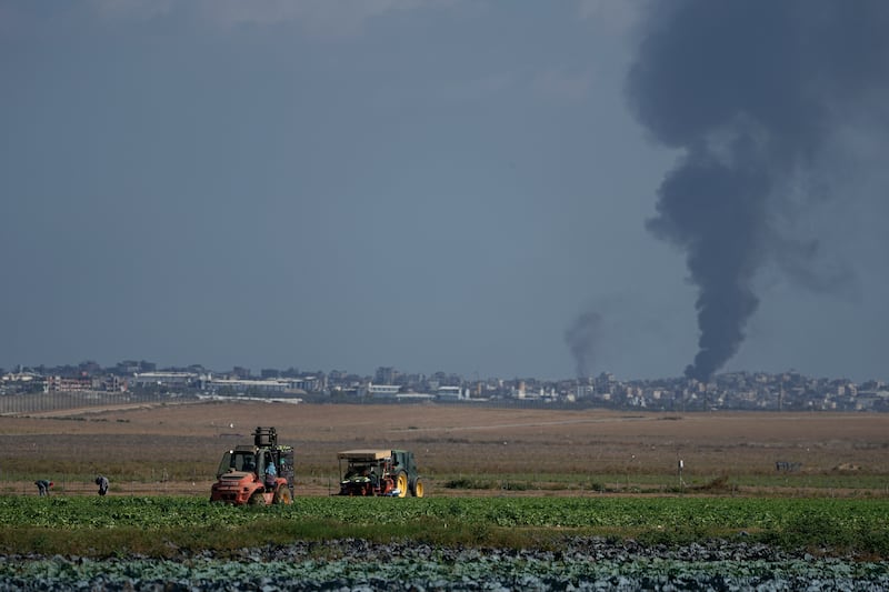 Smoke from Israeli bombardment rises from the Gaza Strip, as seen from southern Israel on Wednesday (Tsafrir Abayov/AP)