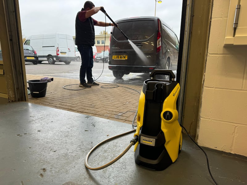 A pressure washer can make cleaning a car much easier