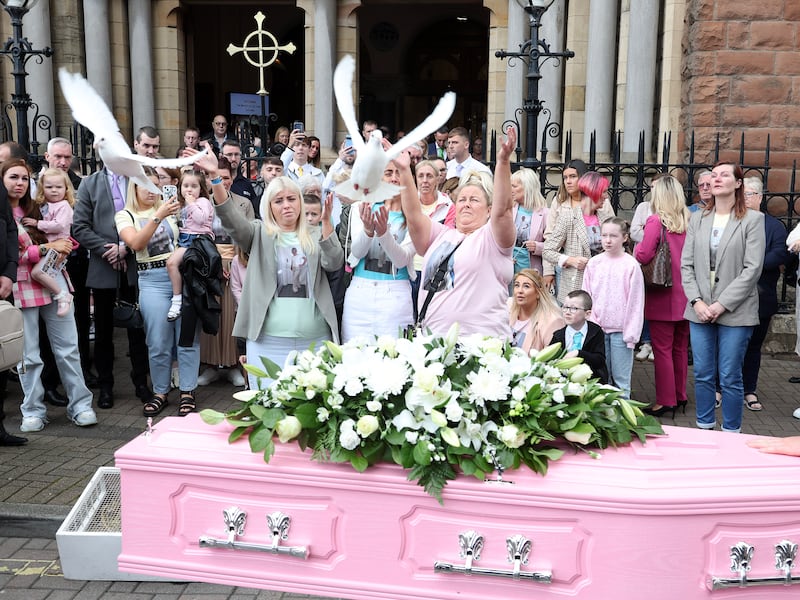 Funeral pink horse and carriage