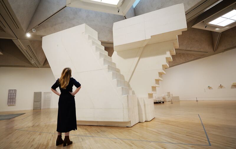 A woman looks at Stairs on display at Tate Britain (John Stillwell/PA)