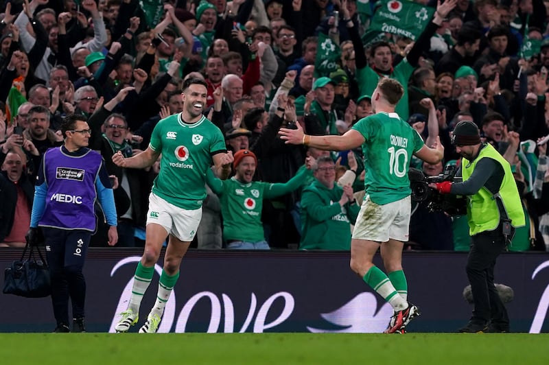 Conor Murray and Jack Crowley celebrate after the final whistle