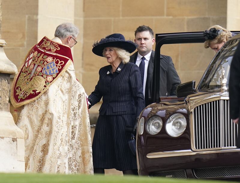 The Queen being greeted at the memorial service for King Constantine on Tuesday