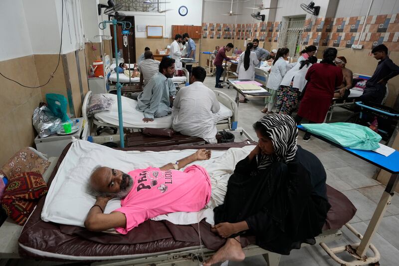 Emergency response centres have been set up at hospitals to help people affected by the heat (Fareed Khan/AP)