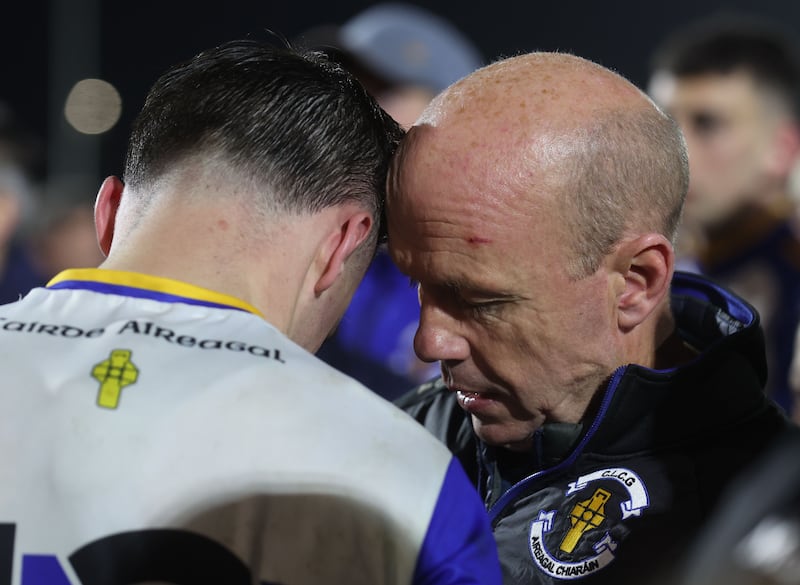 Tyrone legend Peter Canavan  celebrates with with Darragh Canavan  after  winning  the Tyrone Senior Championship Senior Championship Final at Healy Park in Omagh.
PICTURE COLM LENAGHAN