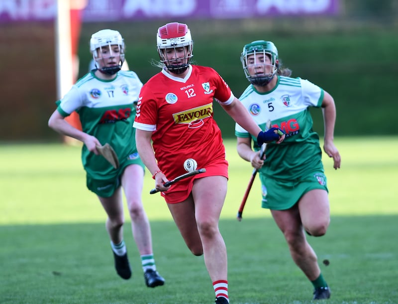 Loughgiel's Annie Lynn with Swatragh's Noeleen Neely and Mary Therese McCullagh in hot pursuit