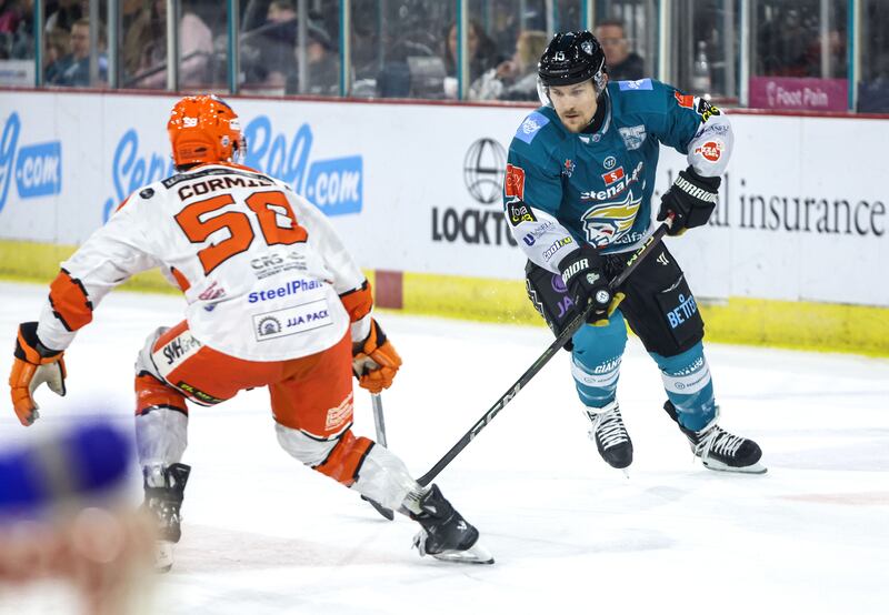 Belfast Giants’ Bobo Carpenter with Sheffield Steelers' Dominic Cormier during  the Elite Ice Hockey League game at the SSE Arena, Belfast.   Photo by William Cherry/Presseye   Photo by William Cherry/Presseye