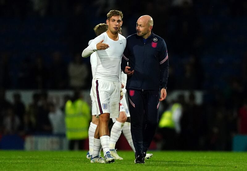 Lee Carsley (right) is going back to his role with the Under-21s