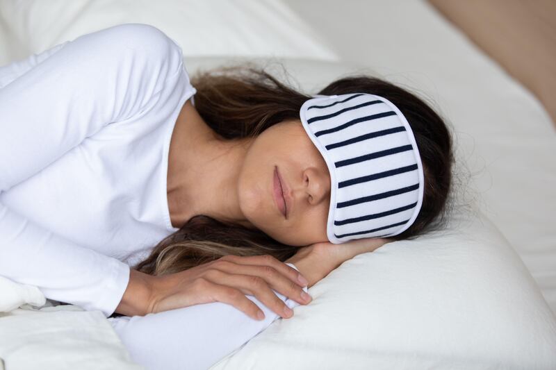 Sleeping with eye masks or weighted blankets can have a grounding and relaxing effect