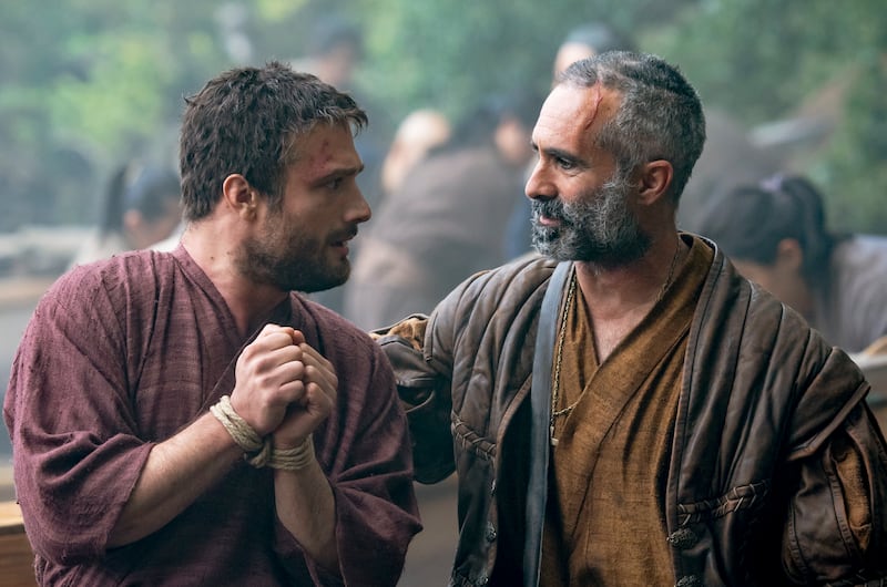 Cosmo Jarvis, left, and Nestor Carbonell in a scene from Shogun