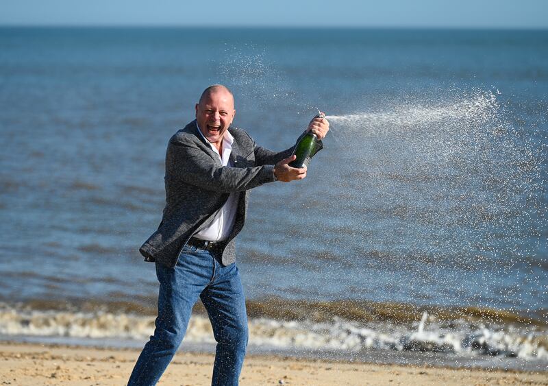 IT worker John Lingard, 66, of Great Yarmouth, celebrates his £500,000 lottery win a year after he had cancer surgery.