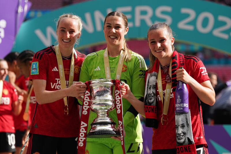 England number one Earps (centre) helped United win the FA Cup