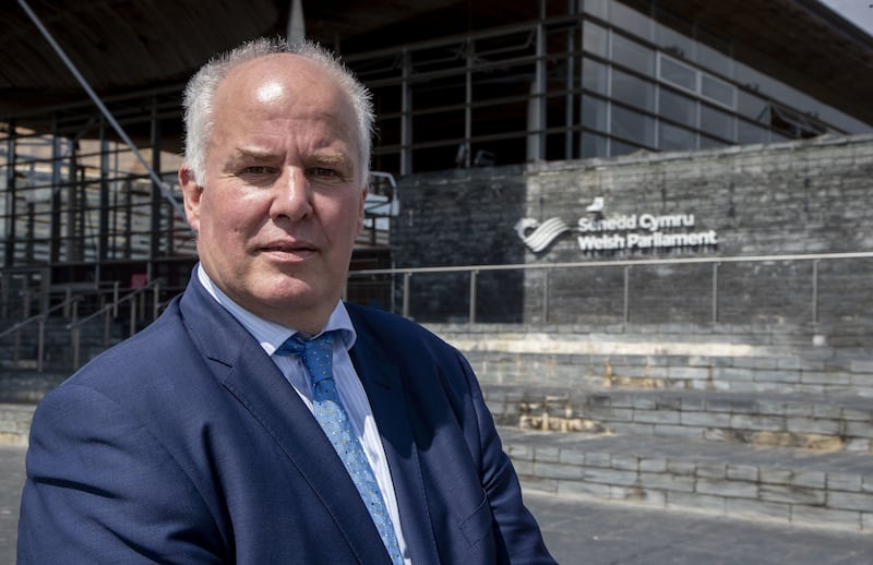 Leader of the Welsh Conservatives Andrew RT Davies standing outside the Senedd