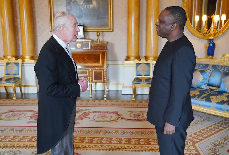 The King welcomes Tanzania’s new High Commissioner to the UK, Mbelwa Kairuki, at Buckingham Palace