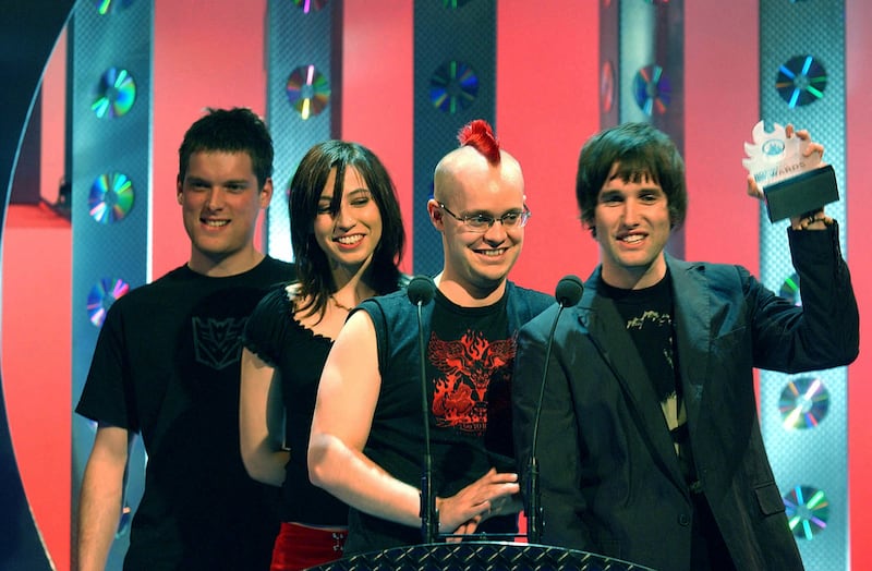 Ash receive their award for Best Irish Album at the Hot Press Awards in Belfast, in 2002