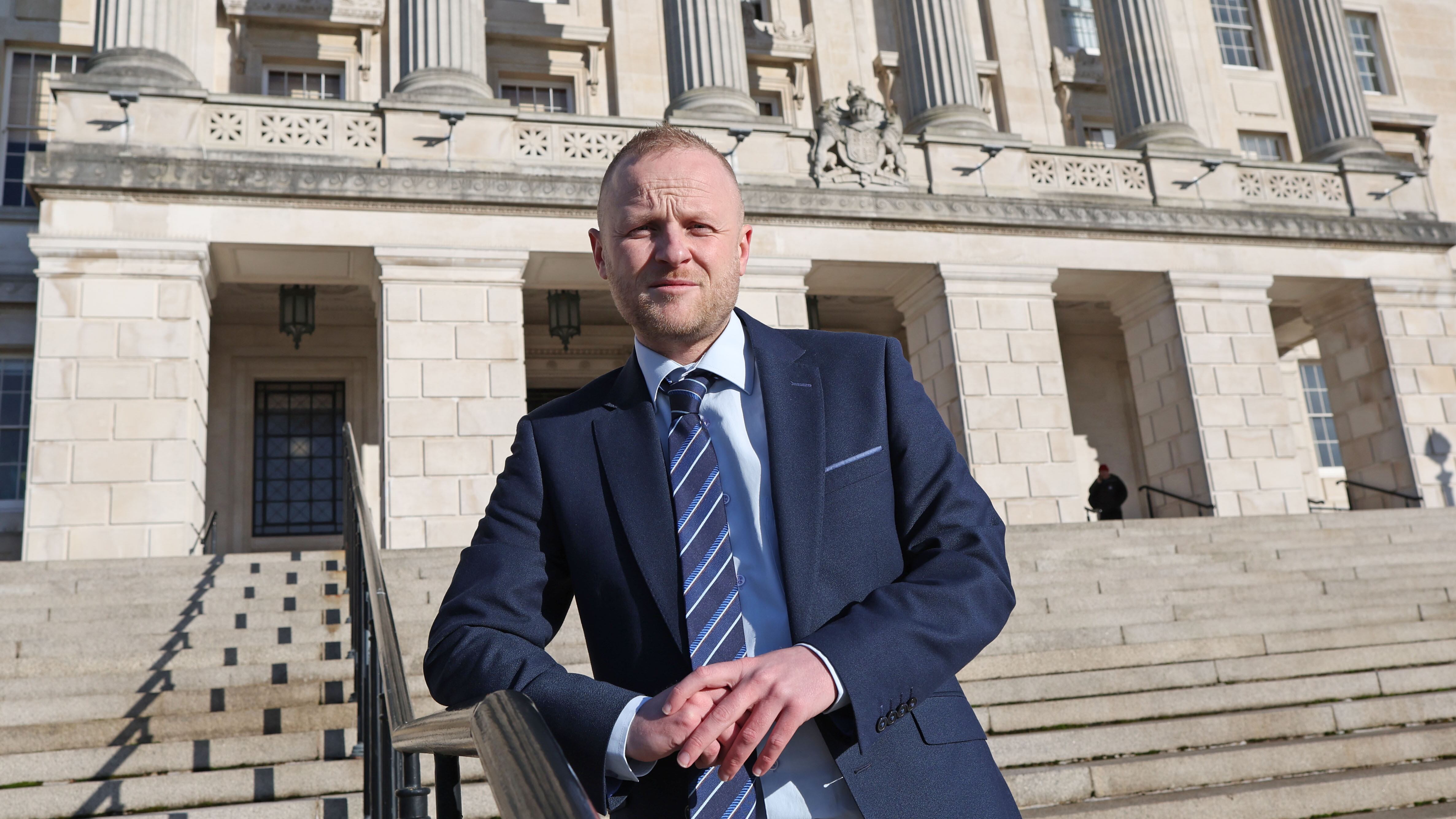 Jamie Bryson at Stormont  on Tuesday, after  the DUP's agreement to return to the NI Assembly - after agreeing to a package of measures put forward by the government.
PICTURE: COLM LENAGHAN