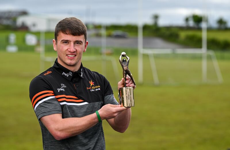Peadar Mogan  with his award at his club Naomh Naille GAA in Mountcharles, Donegal