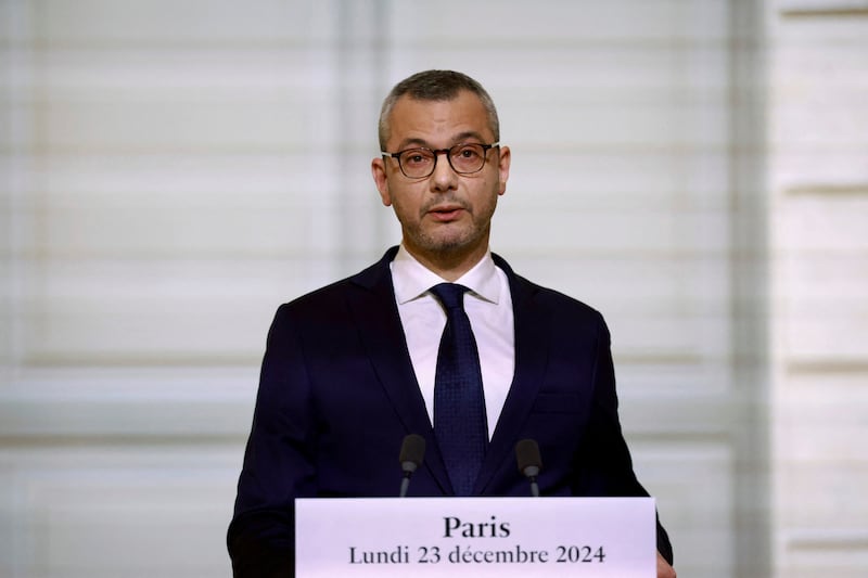 Alexis Kohler, secretary-general of the Elysee Palace, announces the names of the new Cabinet ministers (Saboor Abdul/pool via AP)