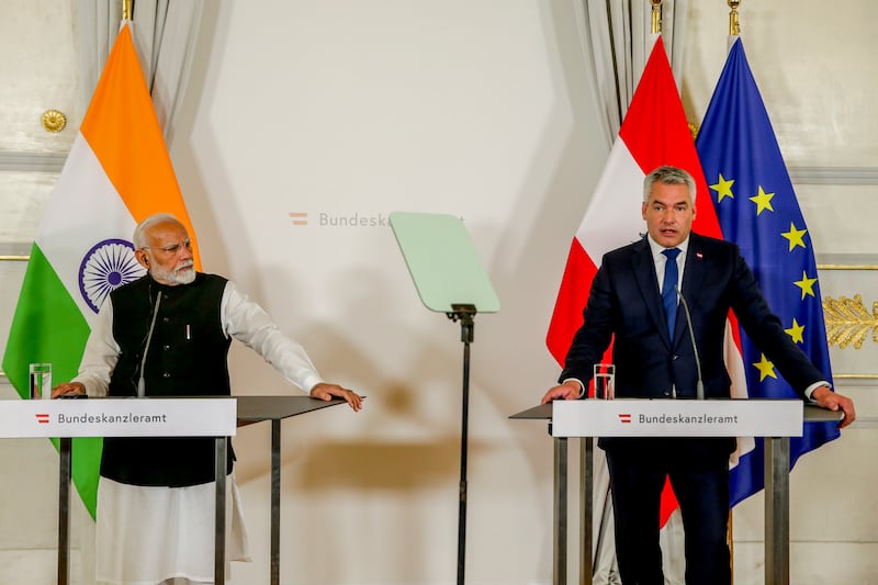 Indian Prime Minister Narendra Modi, left, and Austria’s Chancellor Karl Nehammer held talks in Vienna (Heinz-Peter Bader/AP)