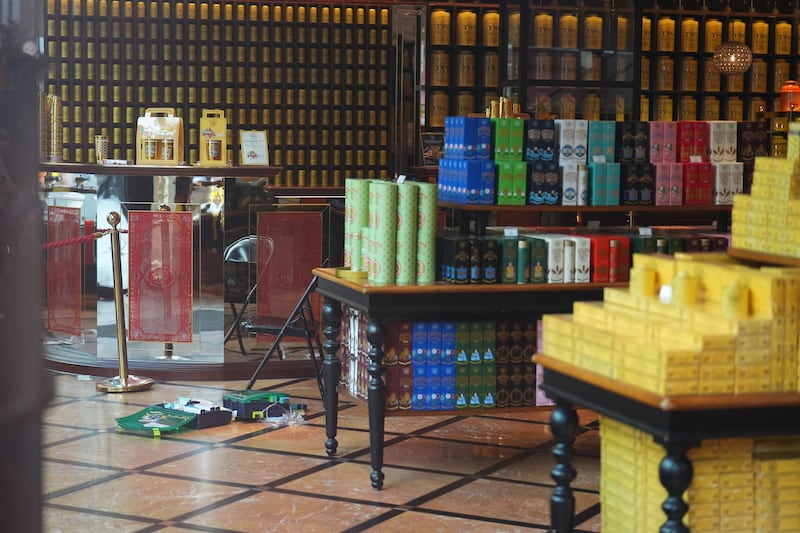 Discarded clothing and emergency medical equipment in the TWG Tea shop following the incident in Leicester Square