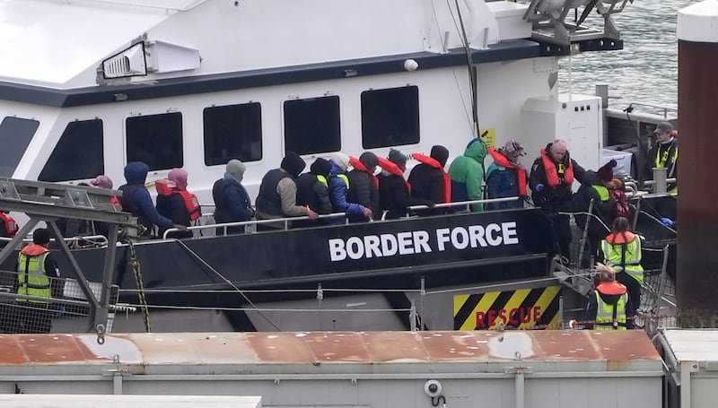 A group of people thought to be migrants are brought into Dover from a Border Force vessel following a small boat incident in the Channel