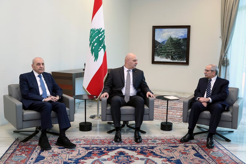 Lebanese President Joseph Aoun, centre, meets Prime Minister-designate Nawaf Salam, right, and Parliament Speaker Nabih Berri, left (Lebanese Presidency press office/AP)