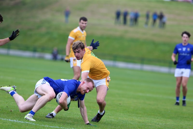 Clonduff's Stephen McConville and Warrenpoint's Aaron Joe Mage in action during the Morgan Fuels Down SFC round one between Clonduff and Warrenpoint.